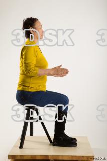 Sitting reference of yellow sweater blue jeans Gwendolyn 0013